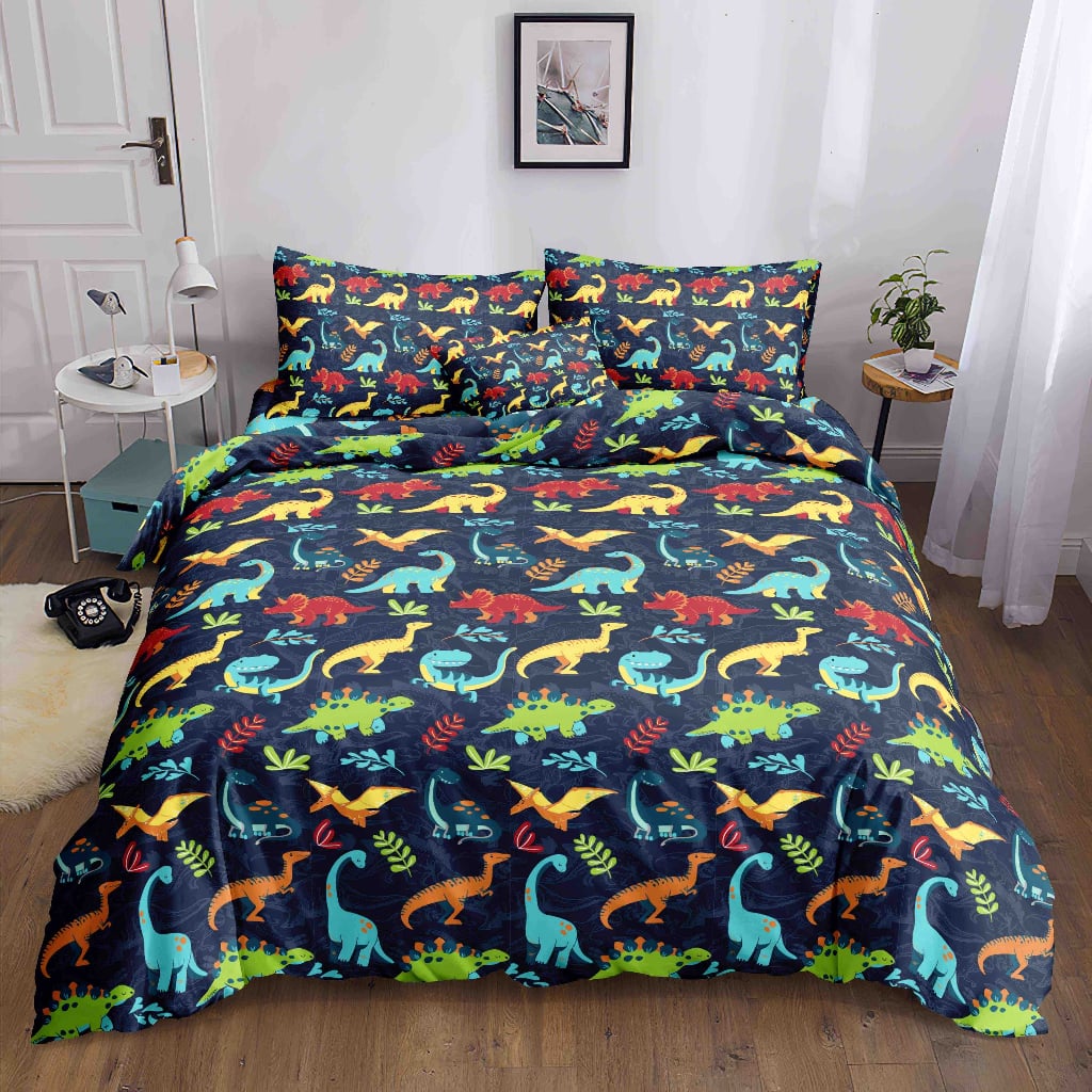 Navy Dino Bedsheet colorful dinosaurs on navy print on bed