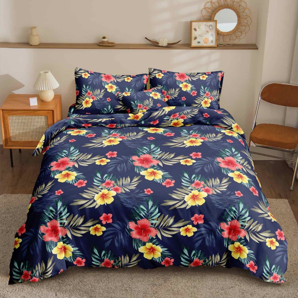 Dark Blue Gumamela Bedsheet red and yellow hibiscus print on navy on bed