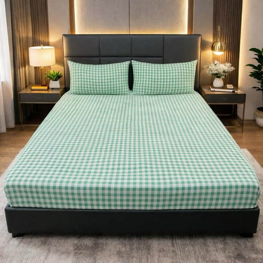 Green Checkered Bedsheet green and white checkered print on bed