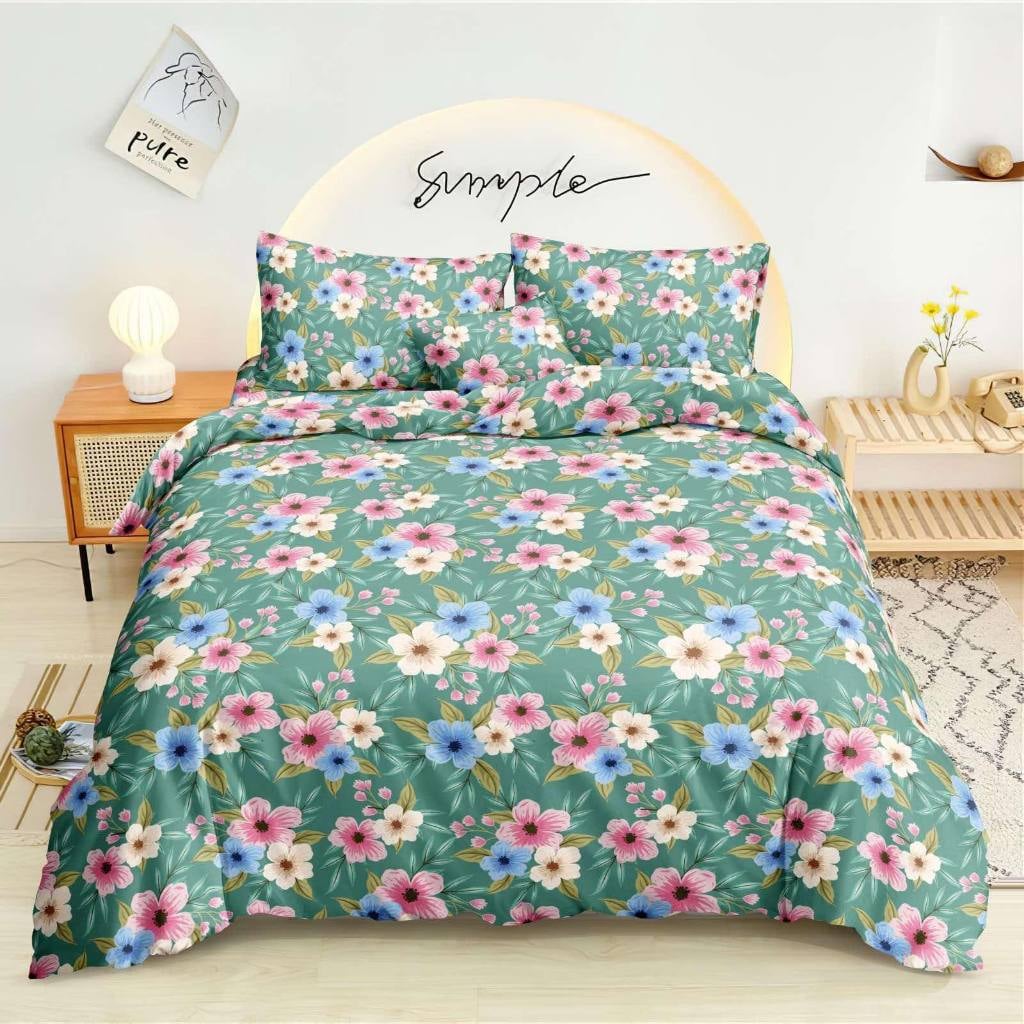 Green Cosmos Bedsheet pink blue and cream florals on sage green print on bed