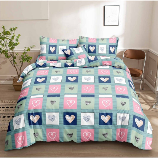 Hearts Frame Bedsheet patchwork heart print in pink navy and sage on bed
