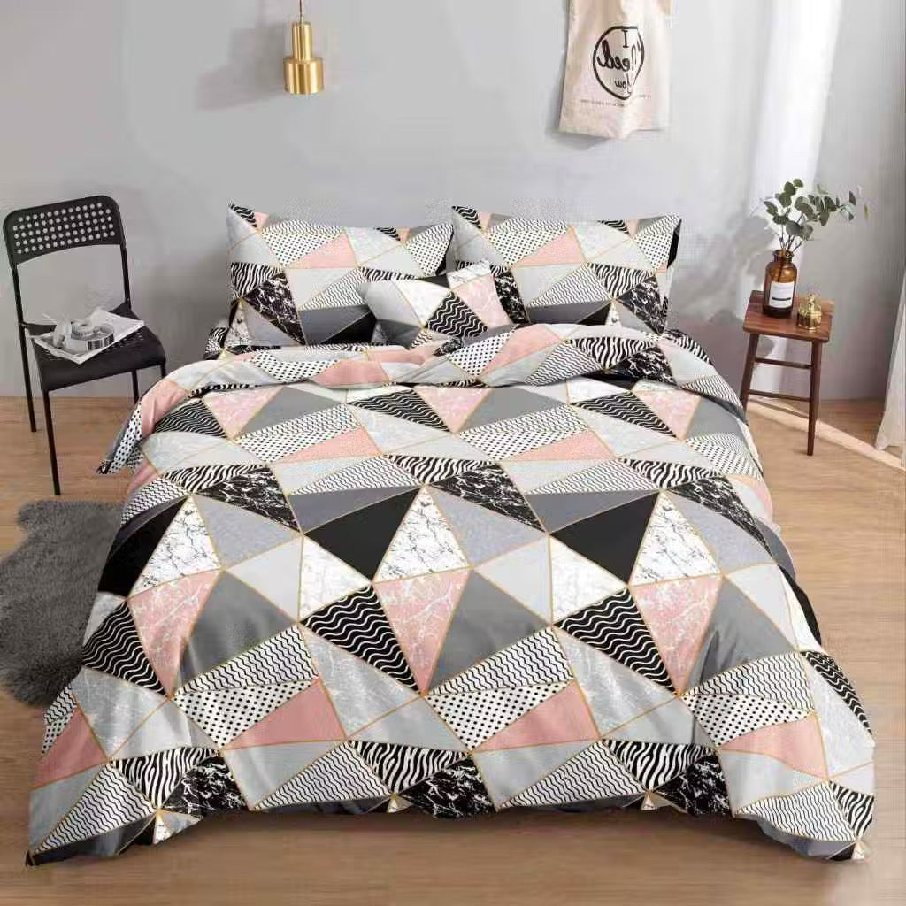 Pink Kumori Bedsheet pink gray and black geometric triangle print on bed