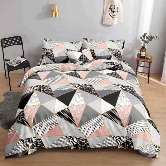 Pink Kumori Bedsheet pink gray and black geometric triangle print on bed