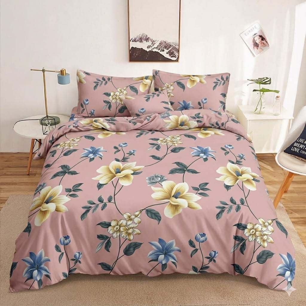 Pink Magnolia Bedsheet magnolia and blue florals on dusty rose print on bed