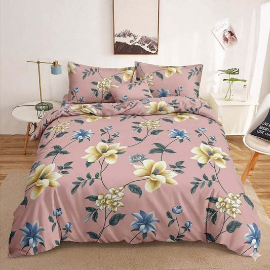 Pink Magnolia Bedsheet magnolia and blue florals on dusty rose print on bed