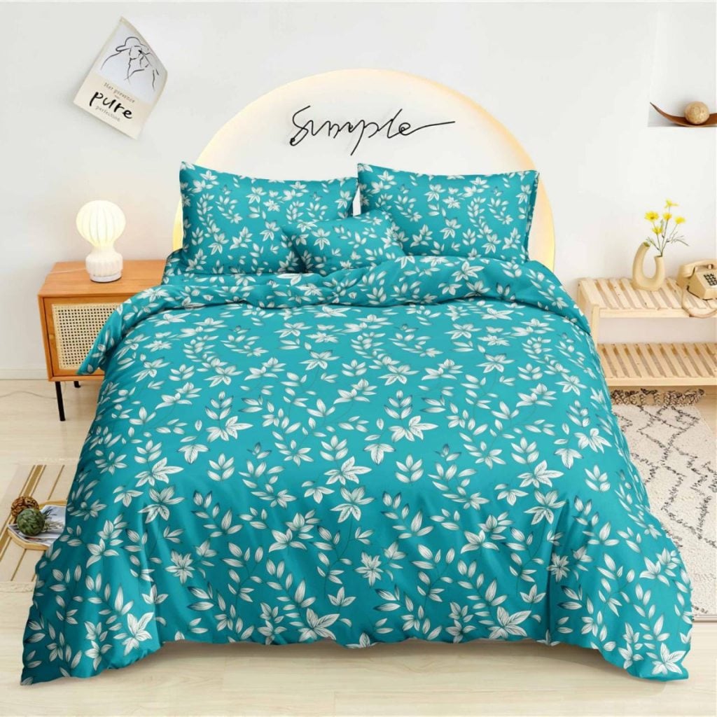 Teal Nature Bedsheet white leaf branches on teal print on bed