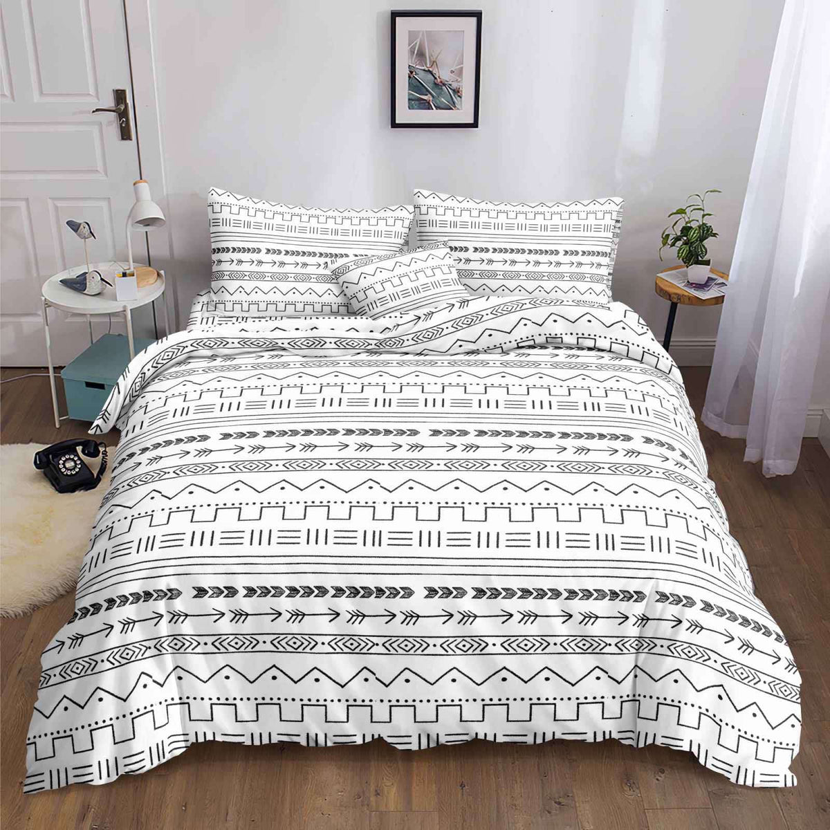 White Boho Bedsheet black tribal line pattern on white print on bed