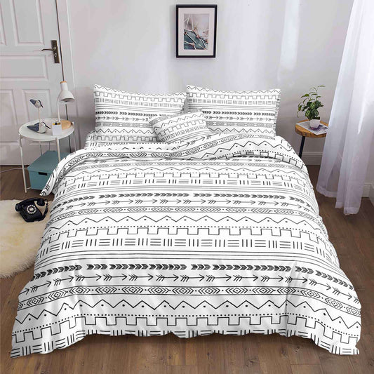 White Boho Bedsheet black tribal line pattern on white print on bed