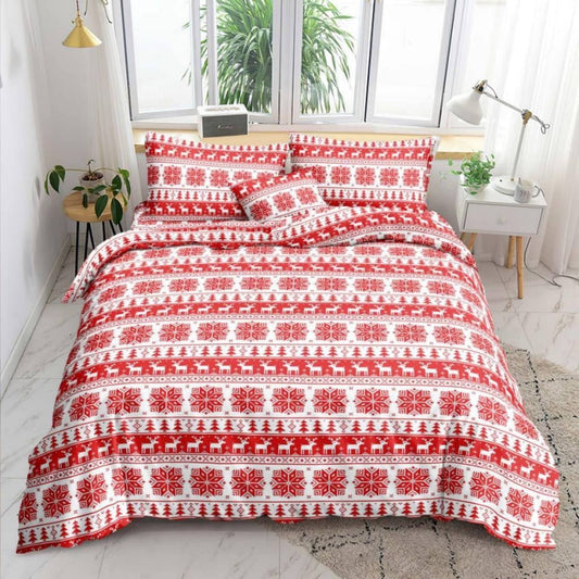Xmas Red Bedsheet red and white reindeer and snowflake print on bed