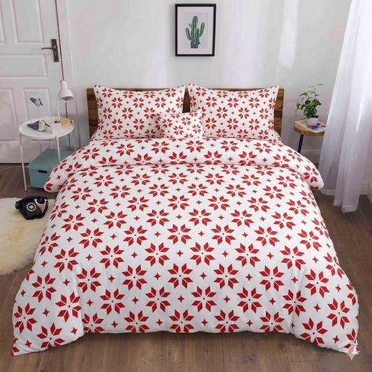 Xmas Sparks Bedsheet red star and snowflake print on white bed